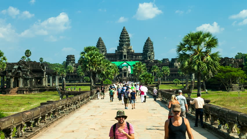 ANGKOR, DECEMBER 12, 2012: Timelapse of tourists visiting Angkor Wat Temple in