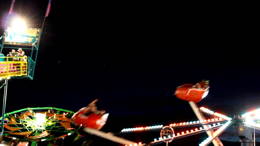 Carnival ride spinning cars