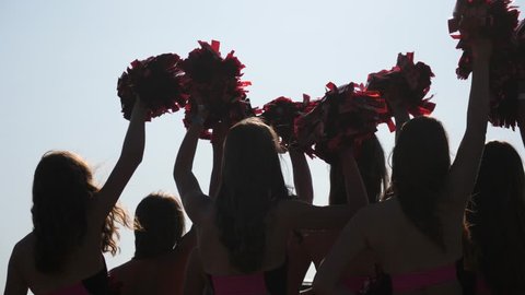 Cheerleader Young Girls Team Silhouettes Raise Hands Sway Wag Pom Poms During Performance Show