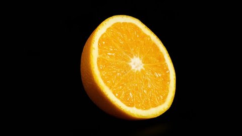 A half orange against black background