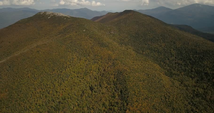 Aerial drone footage of Algonquin peak and surrounding mountains in the Adirondacks, New York.