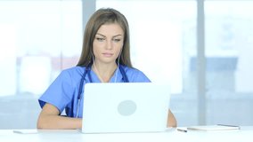 Young Female Doctor Talking with Patient, Online Video Chat on Laptop