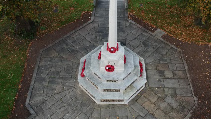 Drone shot from above of a monument with Poppies for remebrance day in UK_08