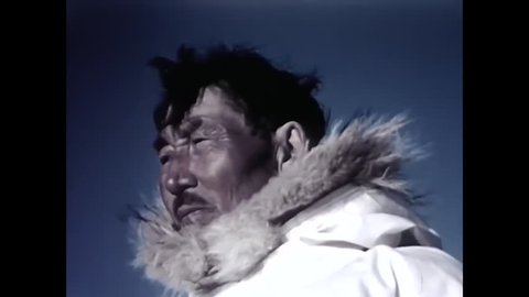 CIRCA 1950s - Eskimos hunt seals in the 1950os.