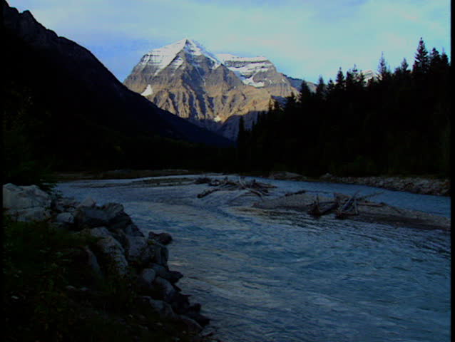Wide shot of beautiful Mount Robson with river in the Canadian Rockies