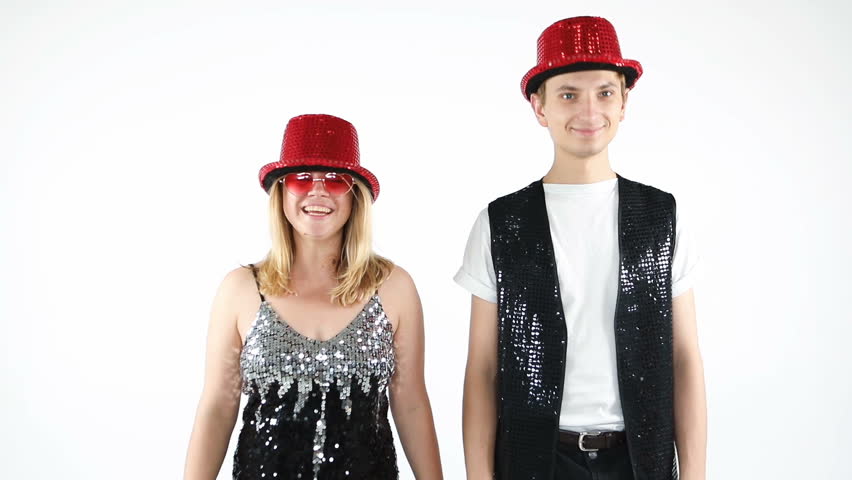 beautiful celebration party mood with flying golden festive confetti.  fancy festive people. White background video footage. 