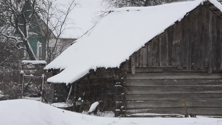Heavy snowfall, an abandoned house