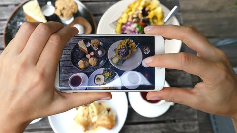 Woman Hands Taking Photos Of Dinner Food By Smartphone. Closeup. 4K. 