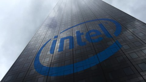 Intel Corporation logo on a skyscraper facade reflecting clouds, time lapse. Editorial 3D rendering