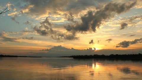 Sunset over a major tributary of the Amazon - the Rio Napo in Ecuador - Timelapse