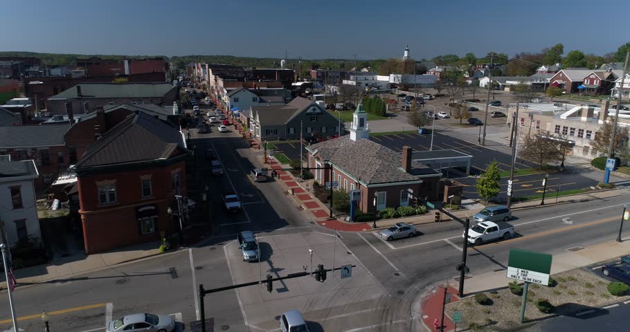 A daytime dolly aerial establishing shot of the small town of Salem, Ohio