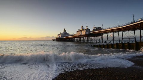 Sunrise over the pier at Eastbourne in Sussex on the south coast