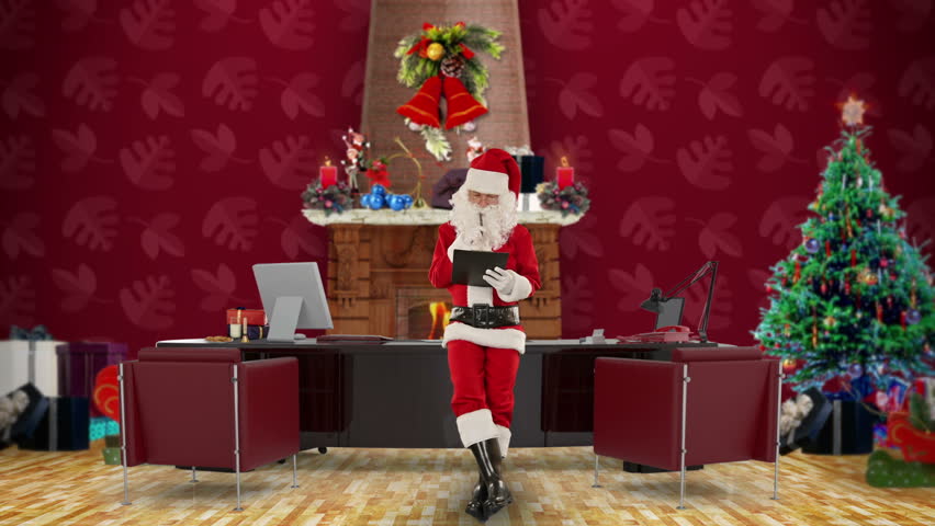 Santa Claus taking notes on a clipboard in his modern Christmas Office