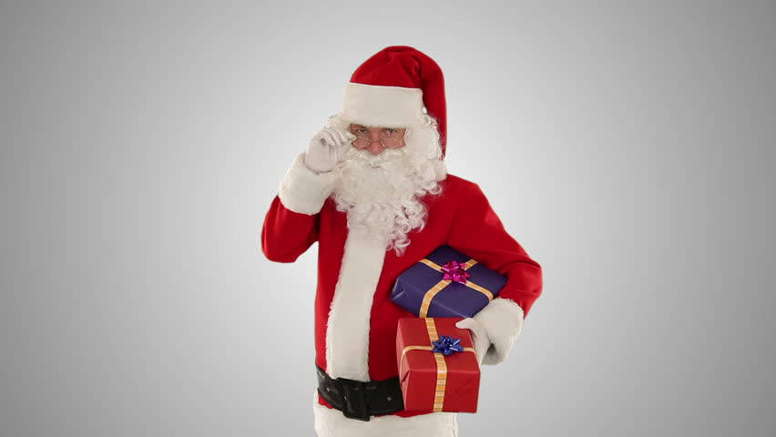 Santa Claus holding presents, against white
