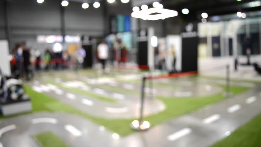 background blur ride a gyroscope on marked paths inside the building