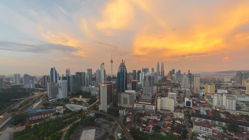 4K Time lapse: Kuala Lumpur cityscape view from day to night at sunset overlooking the city skyline. Moving Down Motion Timelapse. | Shutterstock HD Video #31784644