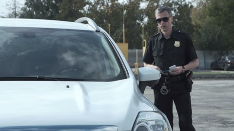 Police Officer Stopping Driver Vehicle Questioning Stock Footage Video ...