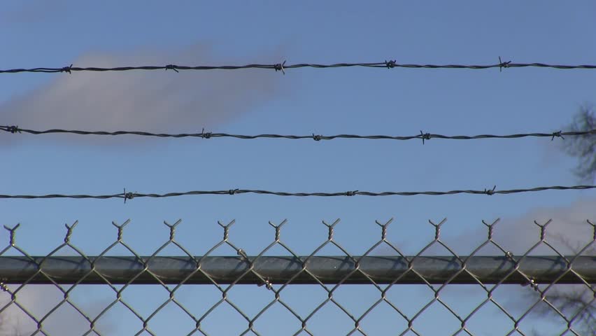 Prison Fence Blue Sky Stock Footage Video (100% Royalty-free) 3181144 ...

