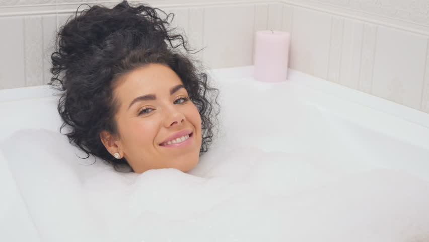 Shower curly brunette messy