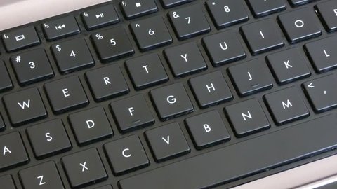 'I Love You' Typing Keyboard. Greetings type by hand, black keyboard.