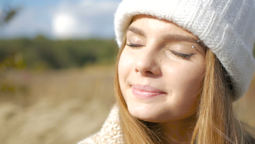 Outdoor atmospheric fashion photo of young beautiful lady. Autumn field. Autumn landscape. Warm autumn. Warm spring