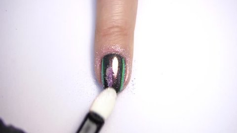 Stylish trendy female mirror manicure. Metal Nail Art. Chrome Nails.