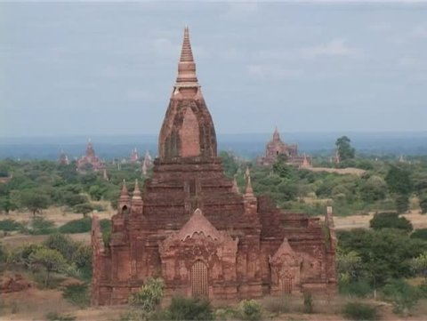 Valley of thousands buddhist pagodas in Bagan, Burma. Pan right to left.