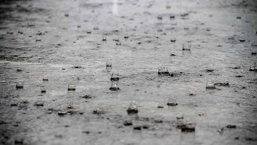 Closeup shot of heavy rain on road/Rain Road Royalty-Free Stock Footage #3183883