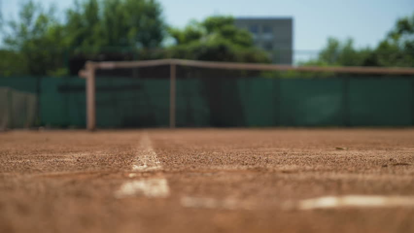 Tennis ball falls on the marking line of the field | Shutterstock HD Video #31853032