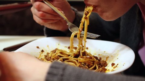 SUPER 35MM CAMERA - Eating spaghetti pastasciutta close-up