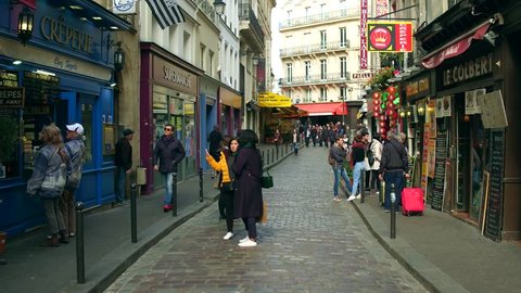 PARIS, FRANCE - OCTOBER 7, 2017. POV walk along the Parisian rue de la Harp, a street in the Latin Quarter.