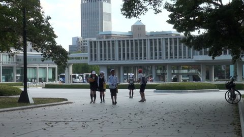 HIROSHIMA - OCTOBER 29: Children are walking away from the museum at the Peace Memorial Park in Hiroshima, Japan on October 29, 2012.