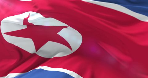 North Korean flag waving at wind with blue sky, loop