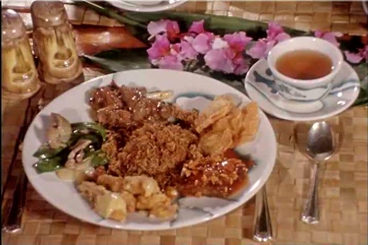 CIRCA 1960s - A plate of Hawaiian food is shown, in San Francisco, California, in 1962.