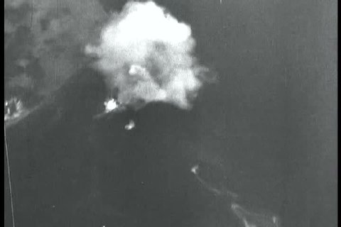 CIRCA 1940s - WW2 news reports on the sinking of the German battleship the Tirpitz.