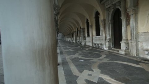 Doge's Palace colonnade, Venice, Italy dolly shot Stock Video