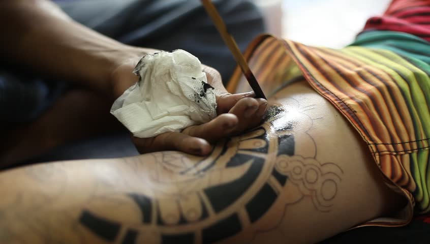 CHANG, THAILAND - DEC 24: Unidentified master makes traditional tattoo bamboo,