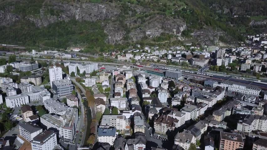 Aerial view of Glacier express at Brig train station, Switzerland. Brig is a historic town and a municipality in the district of Brig in the canton of Valais in Switzerland.