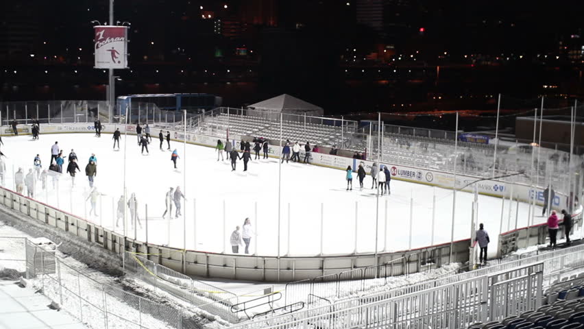 PITTSBURGH, PA - December, 2012: People ice skate at Penguins Pond, an outdoor