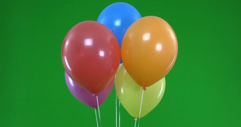 Green screen of colorful Balloons that rise 