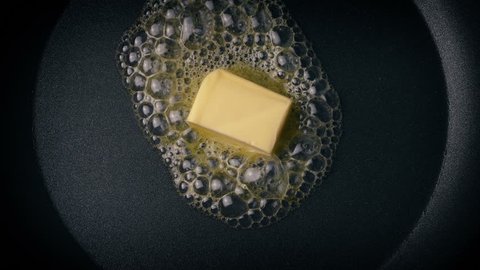 Butter Melting In Frying Pan Overhead Shot