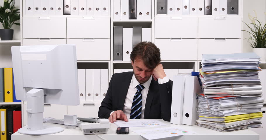 Upset Accountant Man Sad Moment Calculating Annual Taxes Modern Business Office | Shutterstock HD Video #31911502