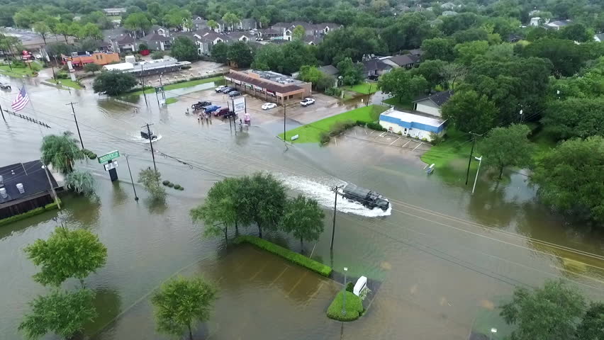 LEAGUE CITY, TEXAS - AUGUST 27th 2017 Military Truck driving through flooded streets during Hurricane Harvey 
