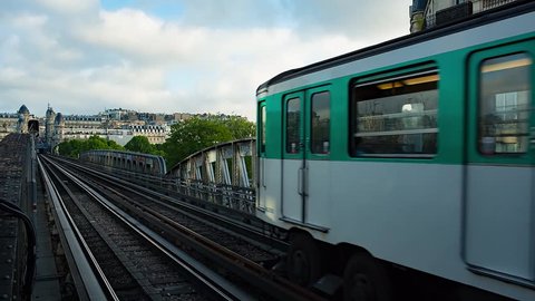 PARIS, FRANCE - JUNE 12, 2017 Departing train on metro station