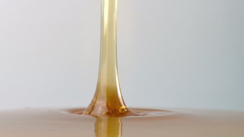 Syrup Pouring Side View Closeup