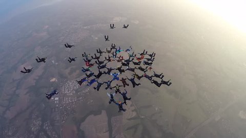 skydiving formation in beautiful sunset