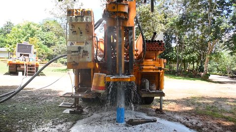 Ground water hole drilling machine installed on the old truck in Thailand. Ground water well drilling and geothermal energy concept.