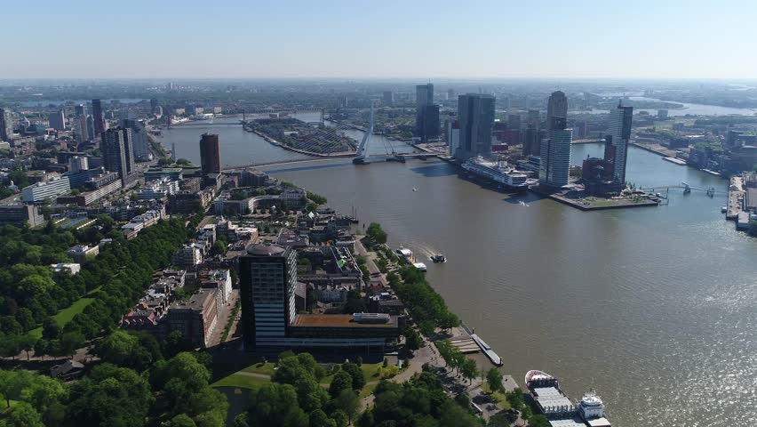 Aerial of Rotterdam city in Netherlands in South Holland its history goes back to 1270 when dam was constructed in the Rotte river this city is major logistic and economic centre Europe