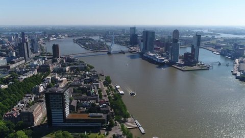 Aerial of Rotterdam city in Netherlands in South Holland its history goes back to 1270 when dam was constructed in the Rotte river this city is major logistic and economic centre Europe's largest port