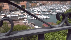 The fence of gate on the one of the house in Monte Argentario with the overlooking of the sea at the back - Powered by Shutterstock - Get 15% off with code: PIKWIZARD15